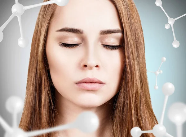 Young woman face among white molecules. — Stock Photo, Image