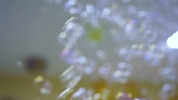 Colorful soap bubbles floating in slow motion. — Stock Video