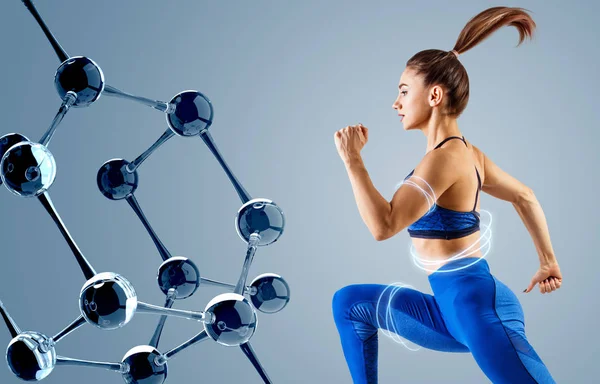 Sporty young woman runing and jumping near molecules chain. — Stock Photo, Image