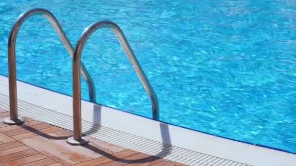 Railing entrance in the water pool. — Stock Video