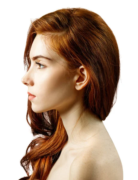 Side view on young redhead woman with serious look — Stock Photo, Image