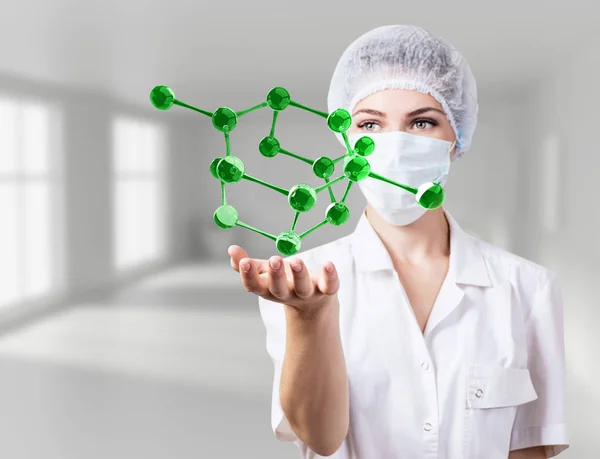 Dokter vrouw demonstreert virtuele moleculen in handen. — Stockfoto