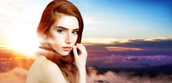 Double exposure of beautiful redhead woman face and sunset