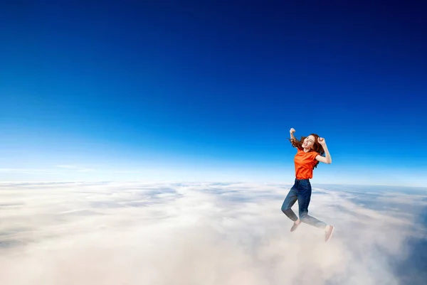 Young woman failed and falling down in clouds sea. — Stock Photo, Image