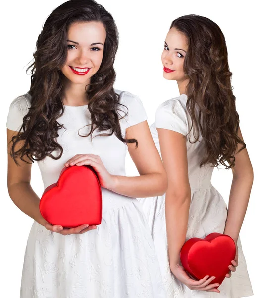 Collage of pretty young woman holding heart-shaped box. — Stock Photo, Image