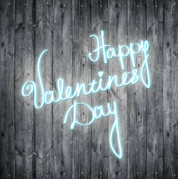 Happy valentines day neon sign over wooden background. — Stock Photo, Image