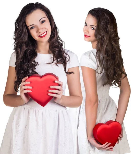 Collage of pretty young woman holding heart-shaped box. — Stock Photo, Image