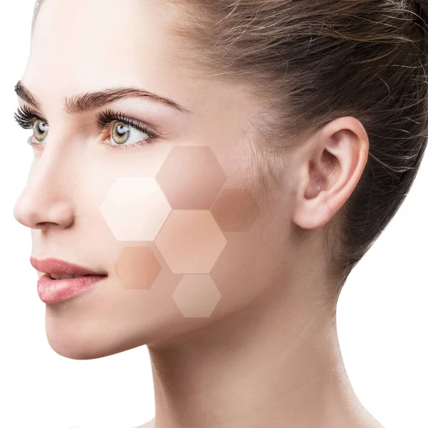 Beautiful female face in honeycombs. — Stock Photo, Image