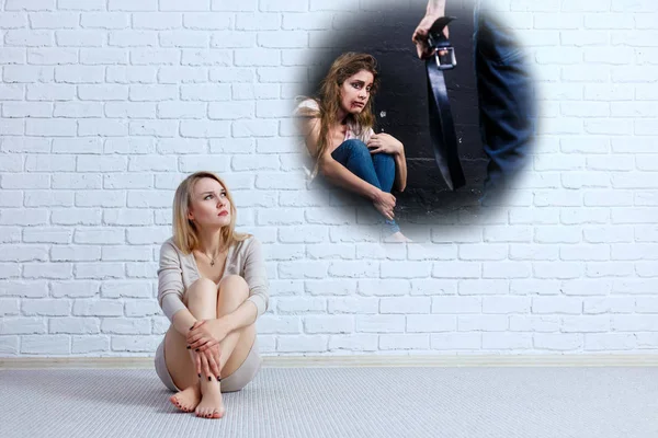 Young woman looking on imaginary scene of beaten woman. — Stock Photo, Image