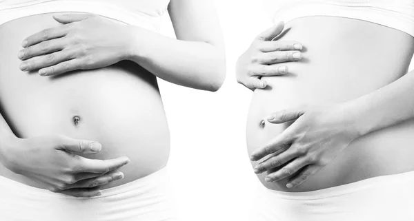 Junge schwangere Frau streichelt Bauch. — Stockfoto