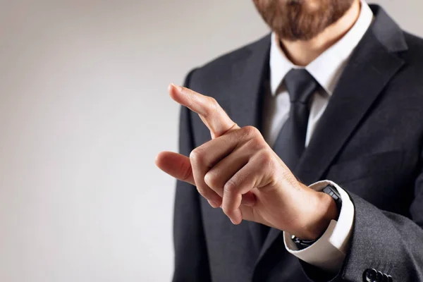 Businessman with pointing to something or touching by forefinger. — Stock Photo, Image
