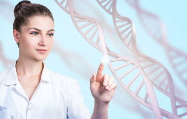 Kadın bilim uzmanı DNA sapına dokundu.