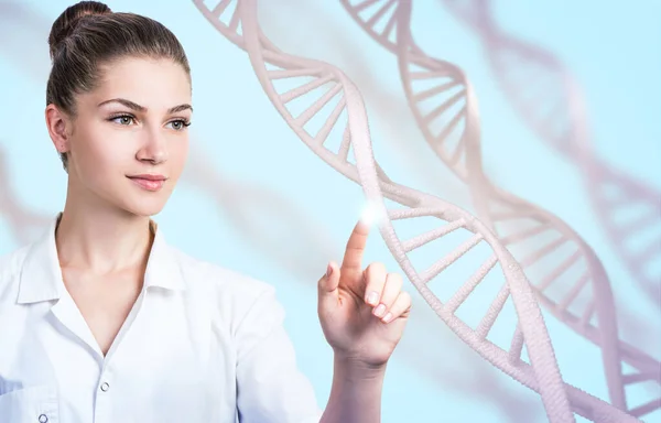 Női tudományos technológus megérinti DNS szárak. — Stock Fotó