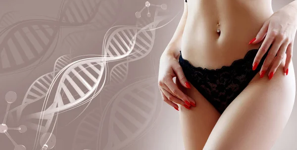 Woman with perfect belly near DNA stems. Slimming concept. — Stock Photo, Image