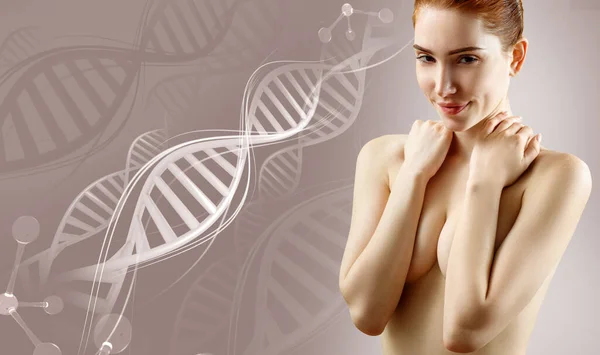 Mulher jovem cobrindo peito por mãos entre hastes de DNA. — Fotografia de Stock