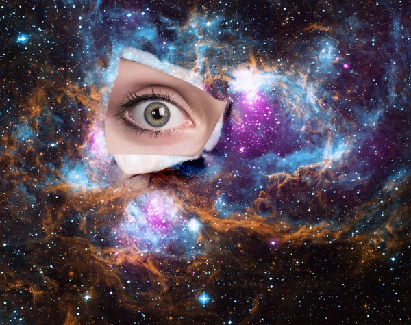 Surprised look through the hole in the space banner. Royalty Free Stock Photos