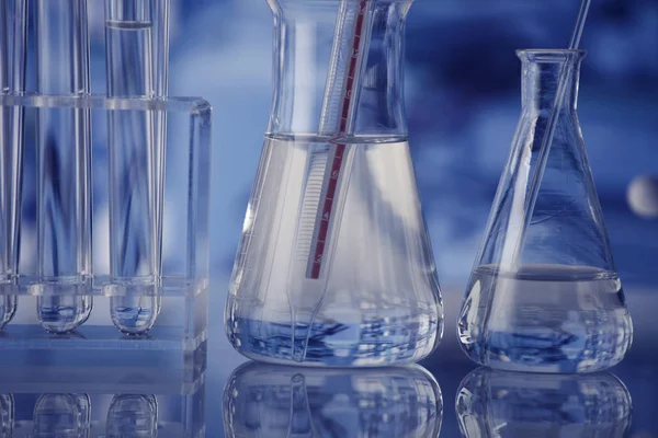 Laboratory Concept Background Glass Tubes Beakers Blue Background — Stock Photo, Image