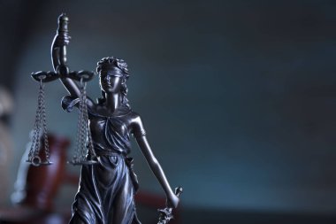 Justice concept. Statue of justice  Themis in the judge office. clipart