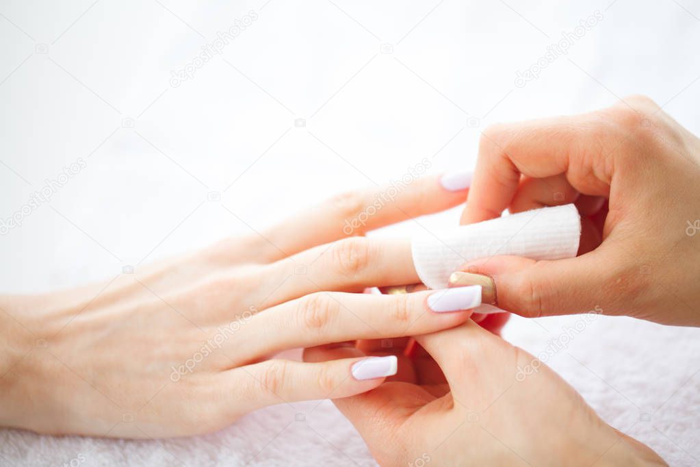 Hand and Nail Care. Beautiful Women's Hands with Perfect Manicure. Manicure Master Holding Cotton Pads in Hands. Beauty Day. Spa Manicure.