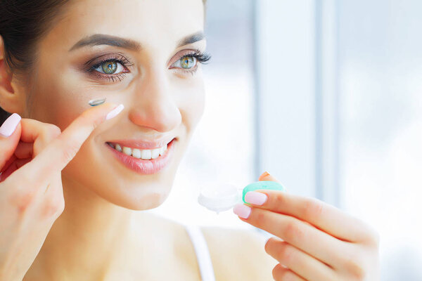 Health and Beauty. Beautiful Young Girl With Green Eyes Dresses Contact Lens. Good Vision. Fresh View. High Resolution