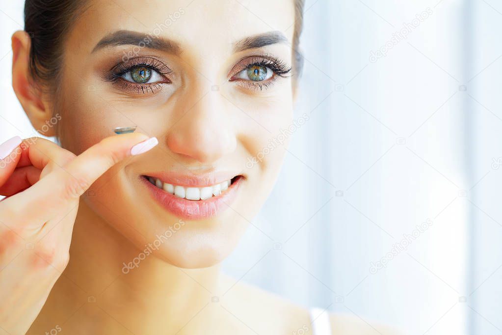Health and Beauty. Beautiful Young Girl With Green Eyes Dresses Contact Lens. Good Vision. Fresh View. High Resolution