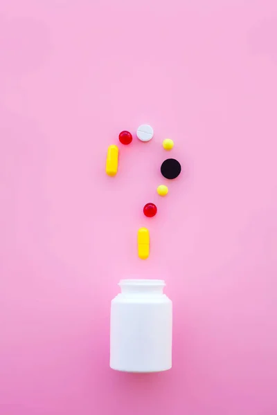 Medical Concept. Pills On Pink Background. Pharmacy Theme, Capsule Pills With Medicine Antibiotic in Packages.