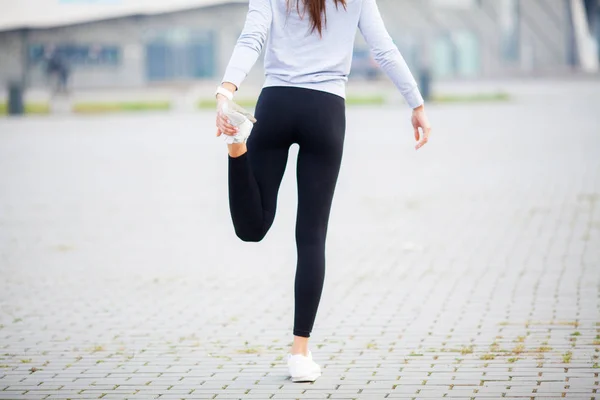 Sport outdoor. Woman Listening Music On Phone While Exercising Outdoors — Stock Photo, Image