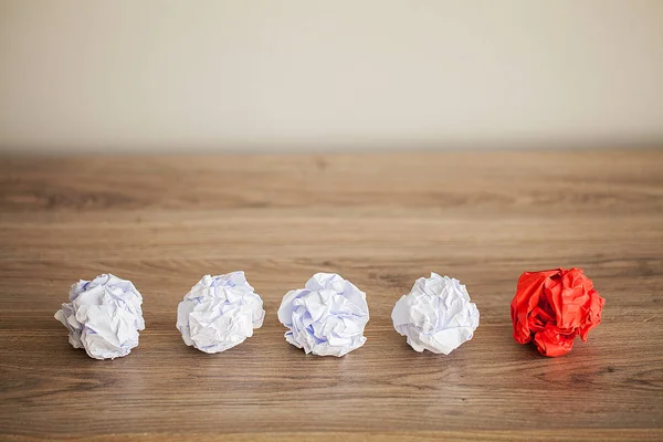 Great idea concept. Crumpled colorful paper on wooden table. Copy space