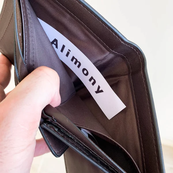 Payment alimony. Empty purse with card alimony.