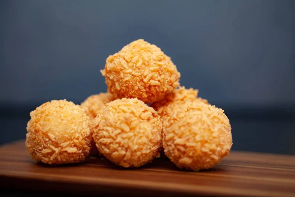 Tasty rice balls on a dark background