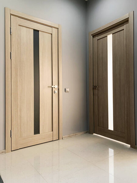 Two beige door to bedroom at home