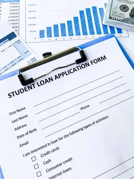 Student loan application form document on table — Stock Photo, Image