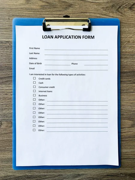 Loan application form document with graph on table — Stock Photo, Image