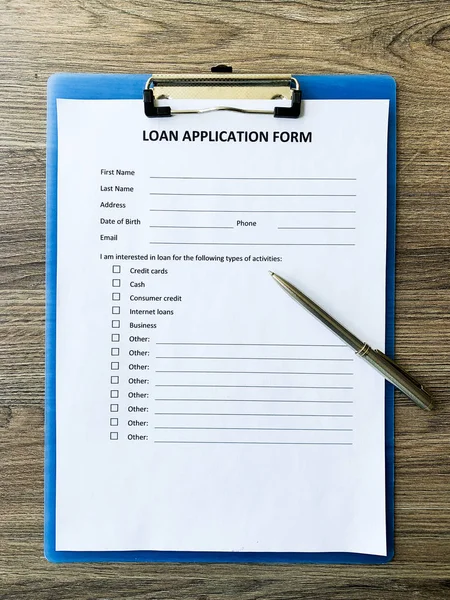 Loan application form document with graph on table — Stock Photo, Image