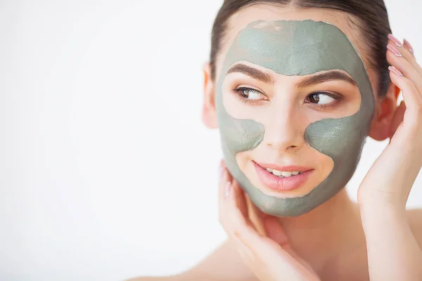 Skin Care. Young Woman With Cosmetic Clay Mask Holding Cucumber At Her Bathroom — Stock Photo, Image