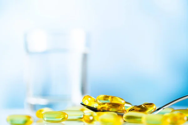 Omega 3 fish oil yellow soft gel capsules — Stock Photo, Image