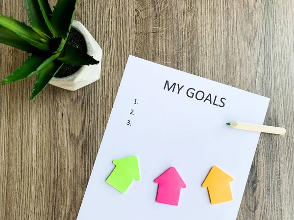 Clipboard with my goals on wood desk. — Stock Photo, Image