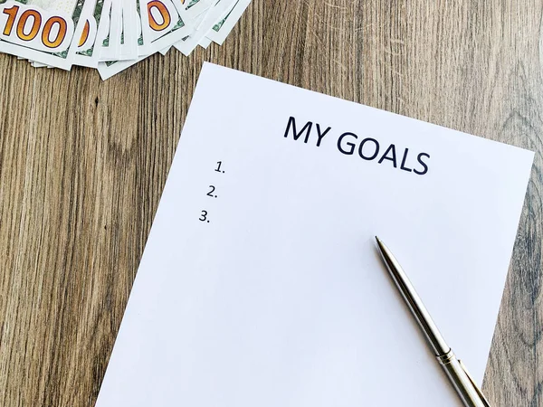 Clipboard with my goals on wood desk. — Stock Photo, Image