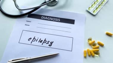 Doktor masasında tıbbi formda epilepsi tanısı.