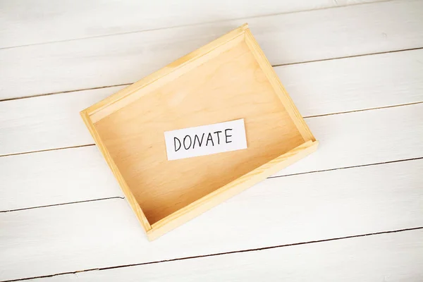 Donations and Charity. Donation Concept. A Donation Box on the White Background.