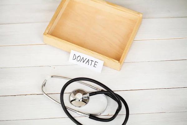 Donations and Charity. Donation Concept. A Donation Box on the White Background.