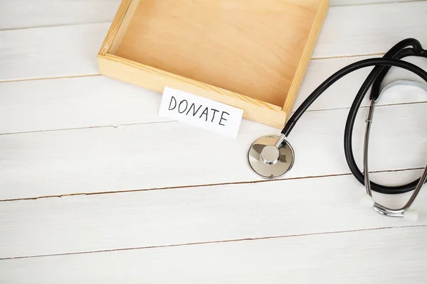 Donations and Charity. Donation Concept. A Donation Box on the White Background. — Stock Photo, Image