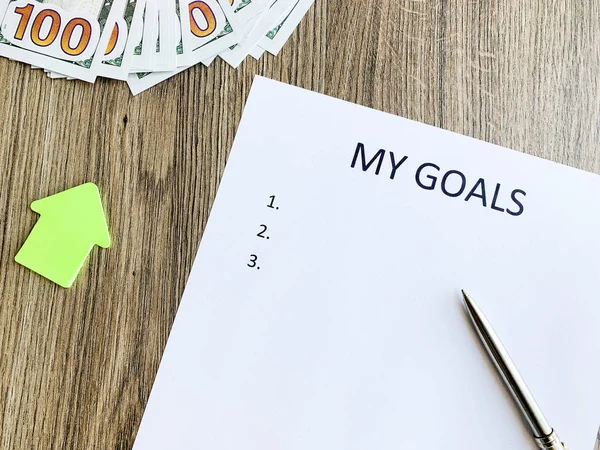 Clipboard with my goals on wood desk. — Stock Photo, Image