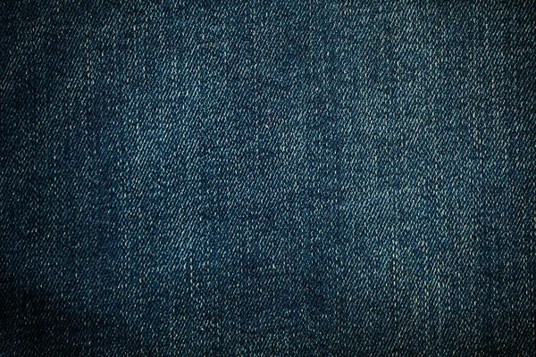 Текстура джинсового або синього джинсового фону . — стокове фото