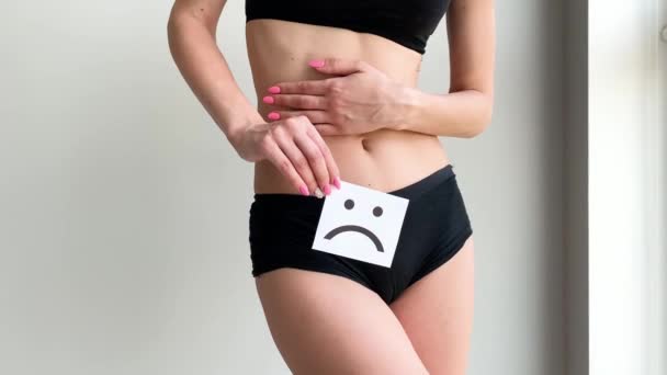 Woman Health. Female Body Holding Sad Smile Card Near Stomach — Stock Video