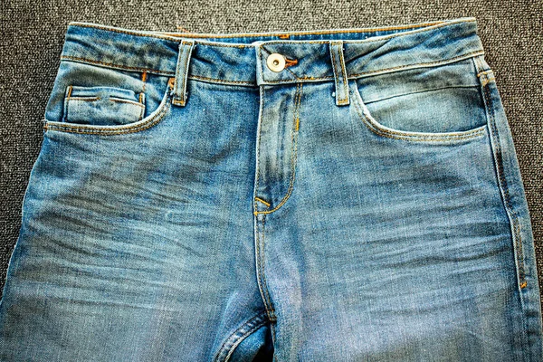 Джинсові блакитні джинси укладають текстуру фону крупним планом . — стокове фото