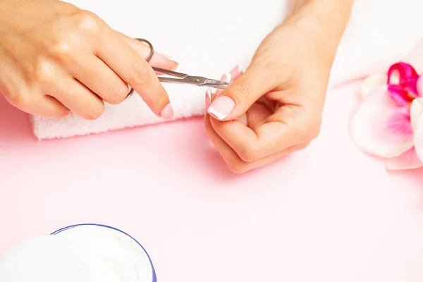 Woman close up of doing manicure on hands — Stock Photo, Image