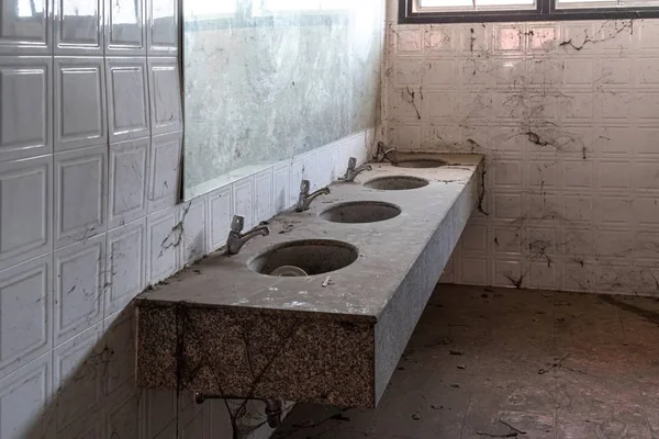 Abandoned toilet. a lot of cobwebs and garbage in abandoned toilet. — Stock Photo, Image