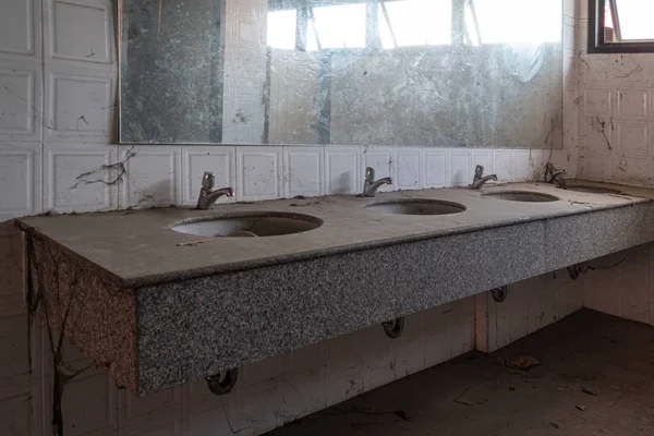 Abandoned toilet. a lot of cobwebs and garbage in abandoned toilet. — Stock Photo, Image