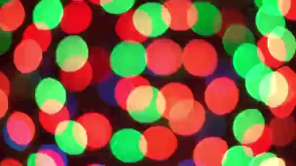 Defokussierte Mehrfarbige Lichtreflexionen Bokeh Hintergrund — Stockvideo
